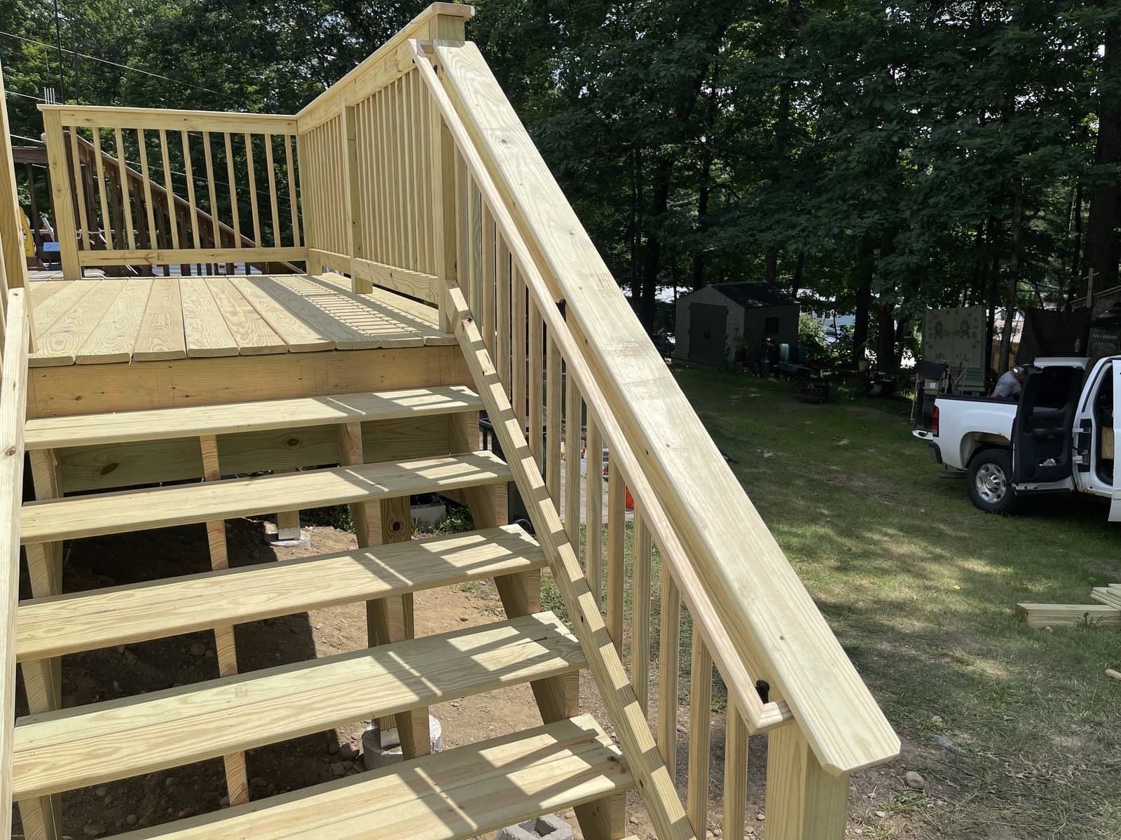 New deck stairs and railings built by Morrison Handyman Services in New Hampshire